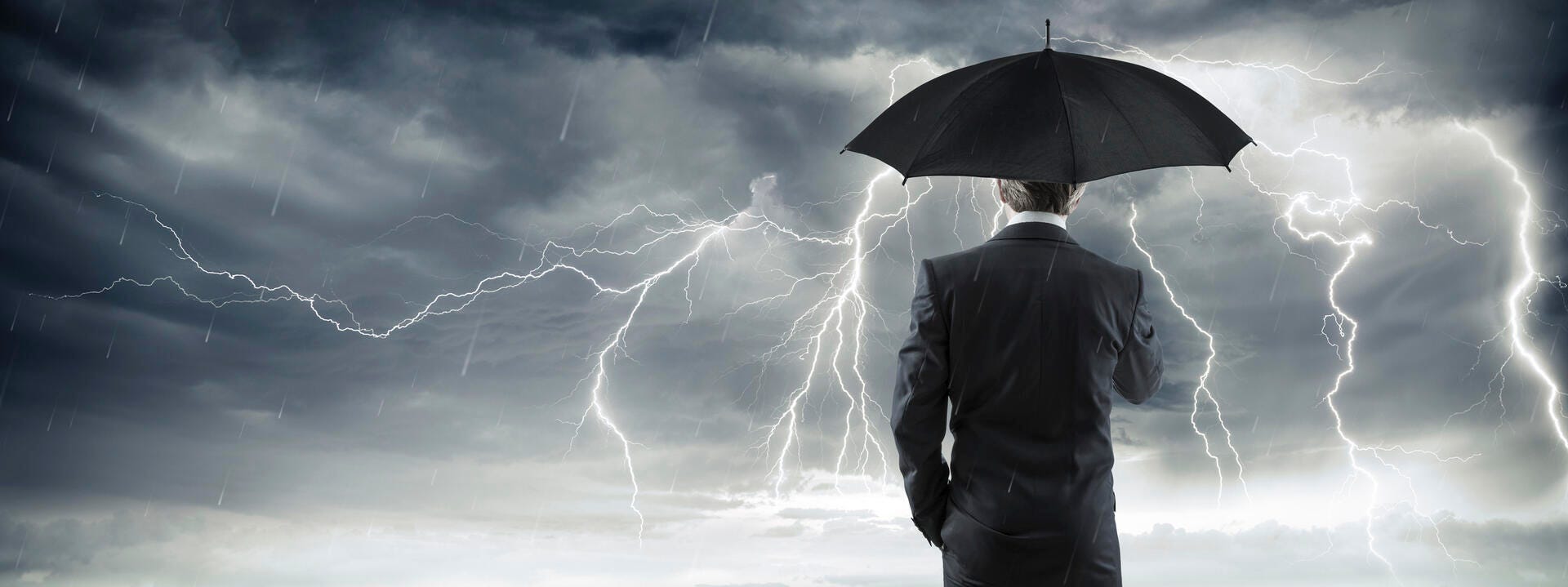 a man holding an umbrella