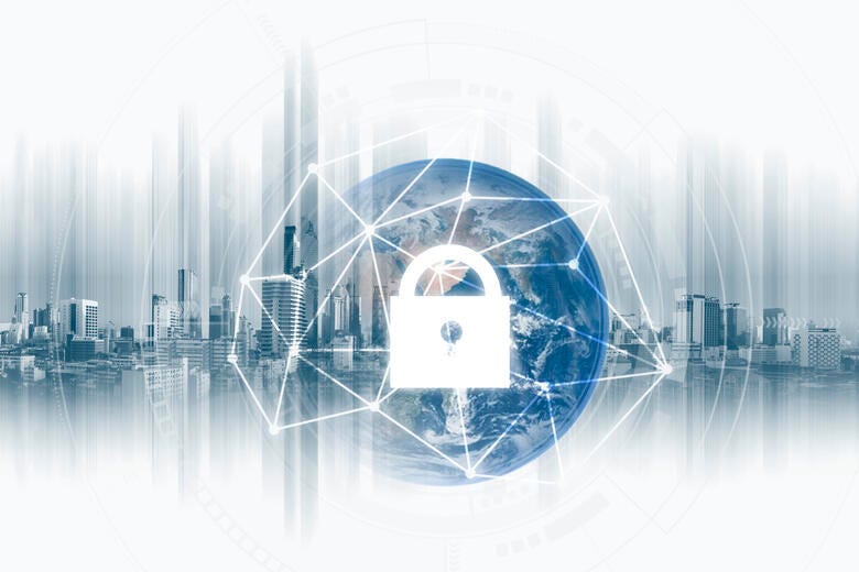 a city skyline with a large circular building in the middle