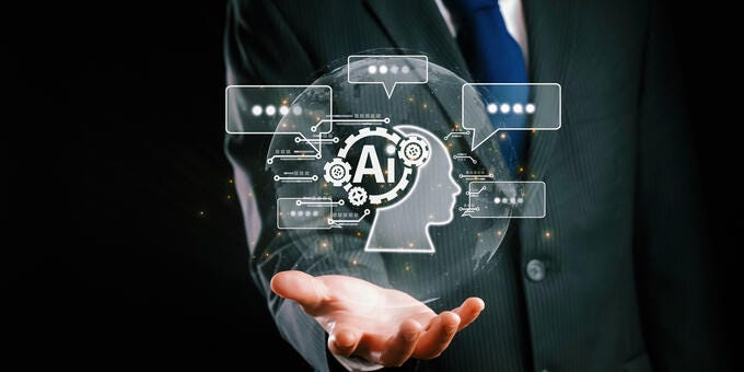 a man holding a large black box with white text