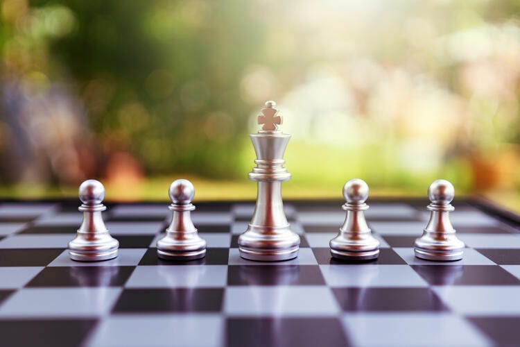 a chess board with chess pieces