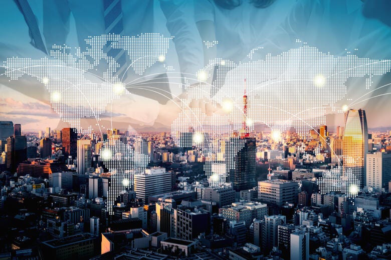 a city with a large reflective building