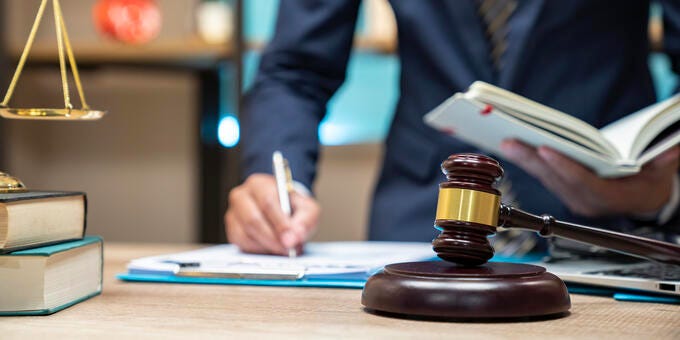 a person writing on a book