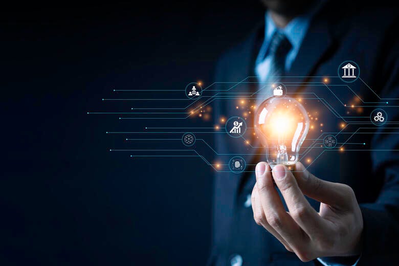 a hand holding a light