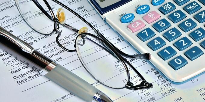 a pair of glasses on a calculator