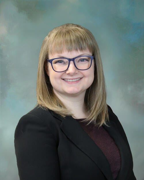 a man wearing glasses