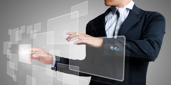 a man holding a tablet