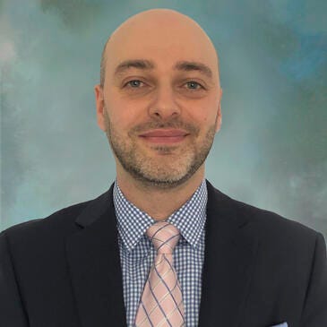 a man in a suit and tie