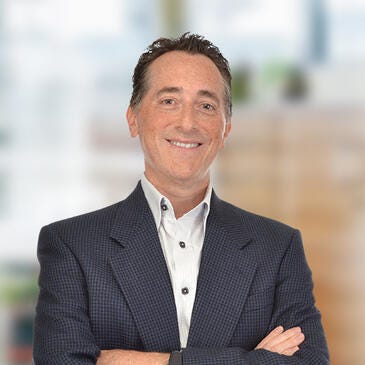 medium shot of a man crossing his arms