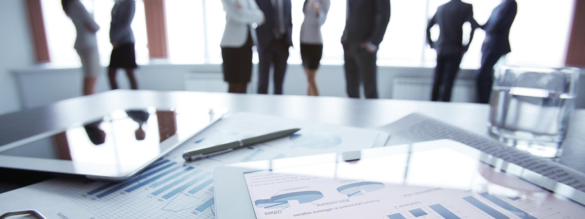 a group of people standing in a room