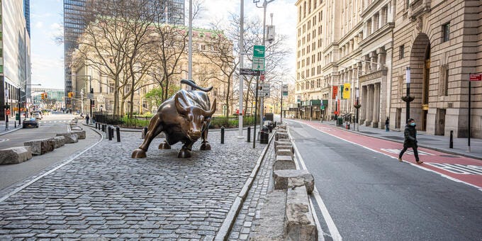 a statue of a horse on a sidewalk