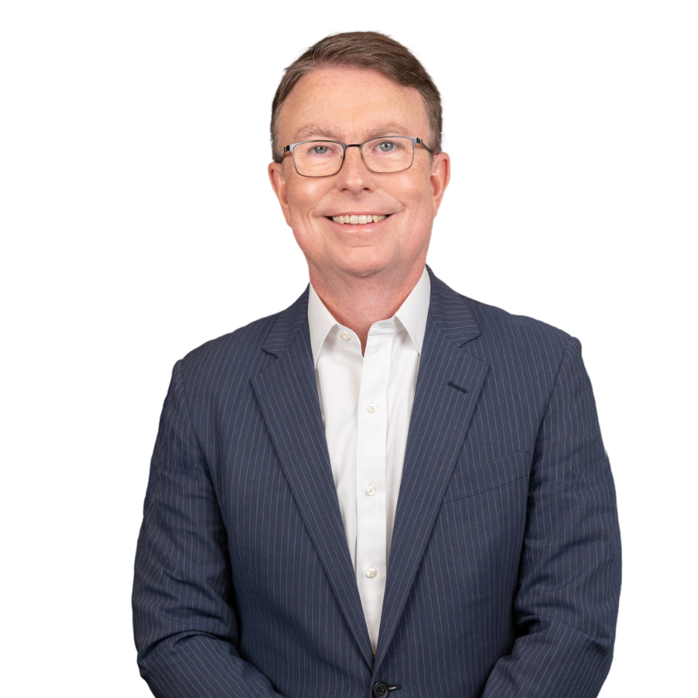 a man wearing a suit and glasses