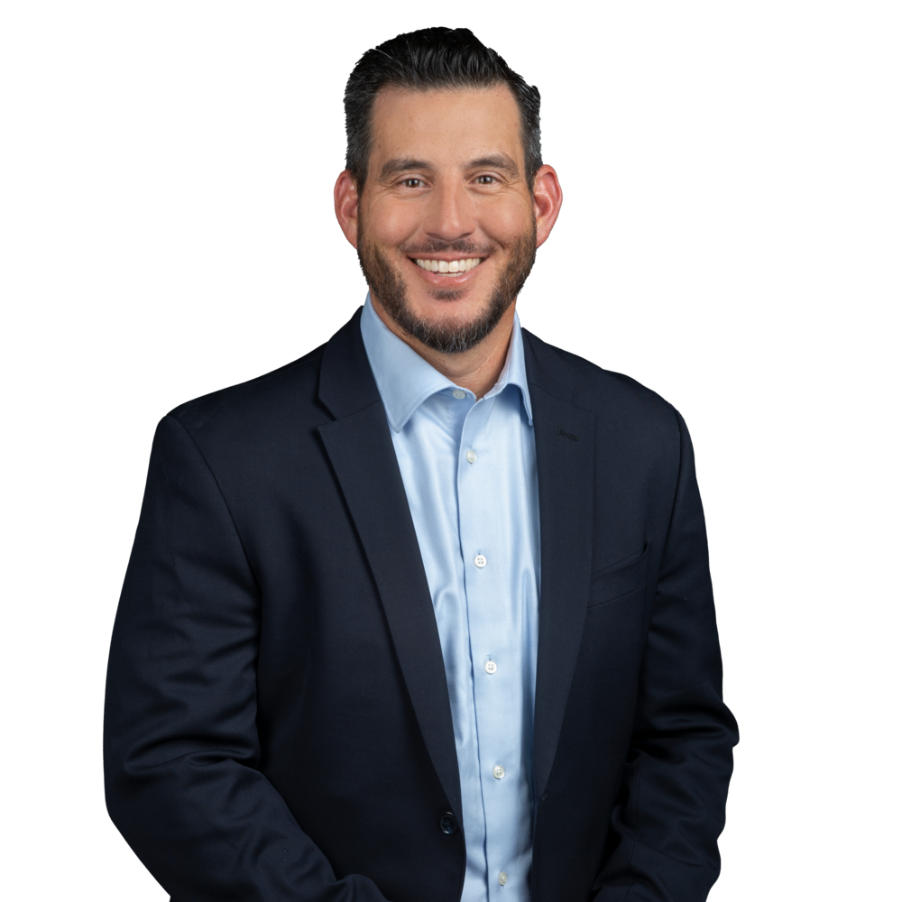 a man in a suit smiling