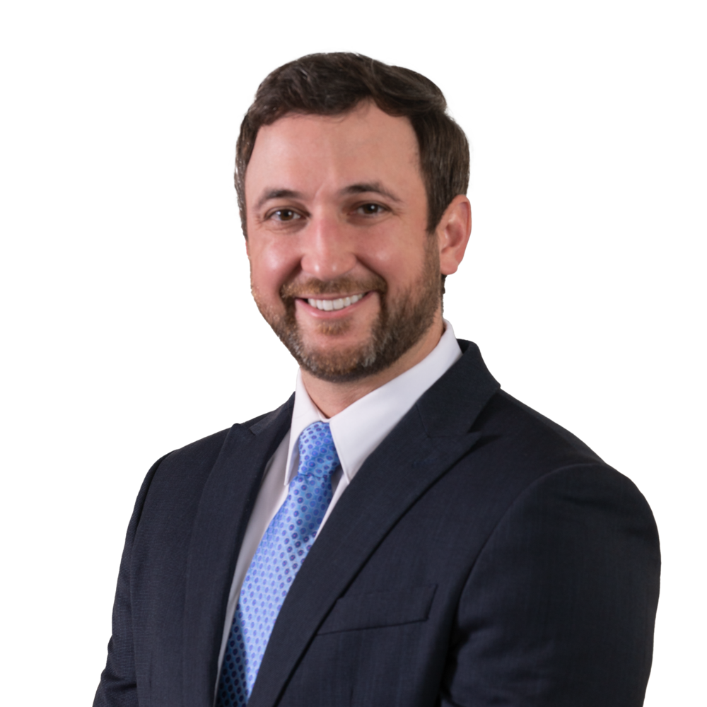 a man in a suit smiling