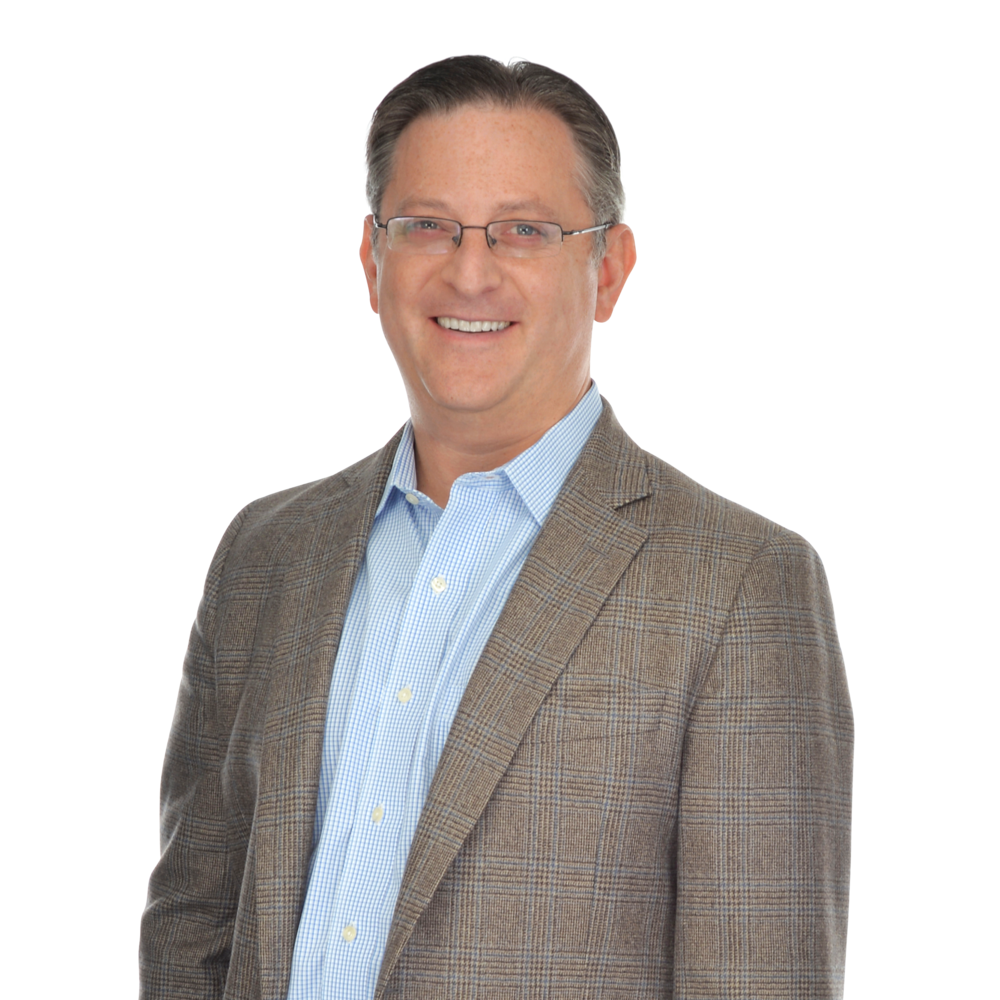 a man wearing a suit and glasses