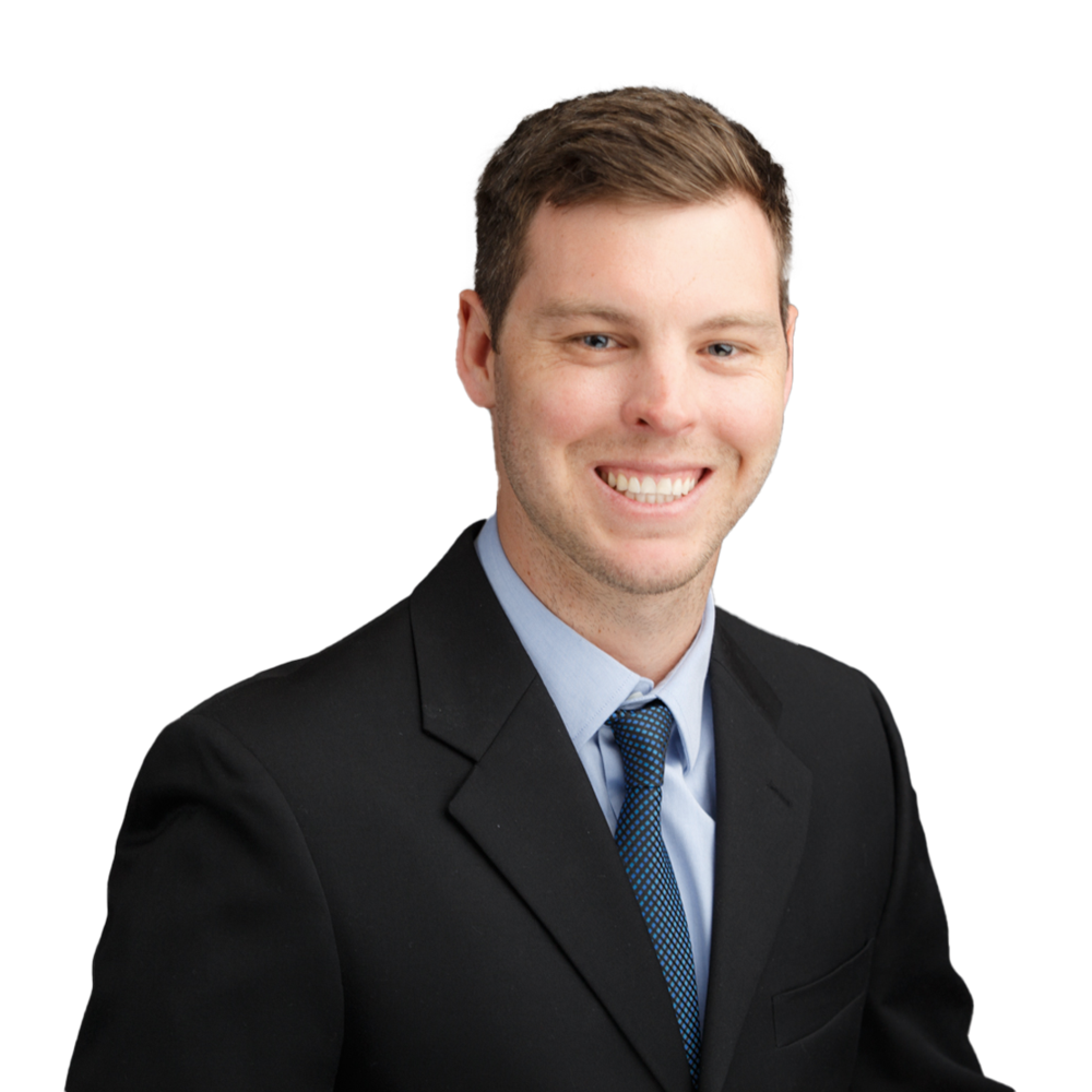 a man in a suit smiling