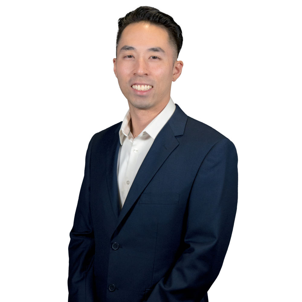 a man in a suit smiling